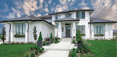 Modern white home with black metal roof, landscaped walkway, and manicured front lawn