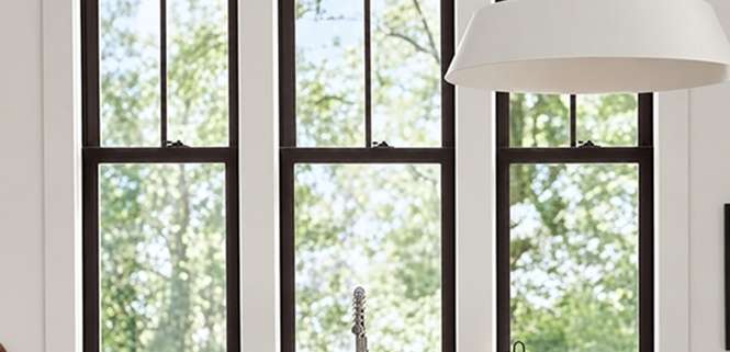 Double-hung window replacement in Round Rock, TX modern kitchen